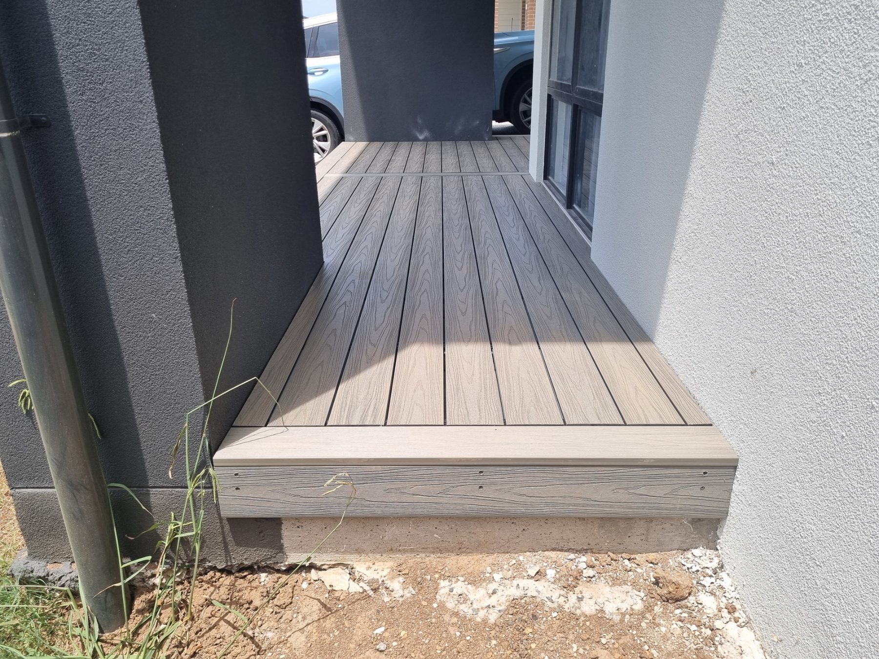 Composite deck landing at front entry